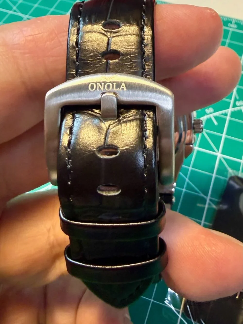 Onola quartz men's watch silver and black leather strap. Rainbow Gems Bezel.